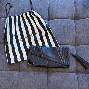 L.A.M.B. Black Leather Zip-Around Clutch with Tassel Accent